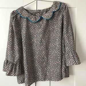 Fun scalloped dollar shirt size m